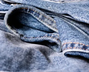 Miley Cyrus Boldly Leaves Shirt Unbuttoned in Dior Double Denim