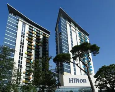 When Did Hilton Acquire Hampton Inn