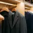 The Plastic Hanger Distortion: Why Cheap Hangers Ruin Tailored Shoulders (The Gravitational Shear Physics)