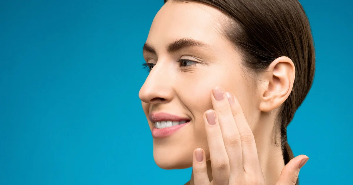 What is a Pin Sized Hole in the Skin glowing healthy skin woman