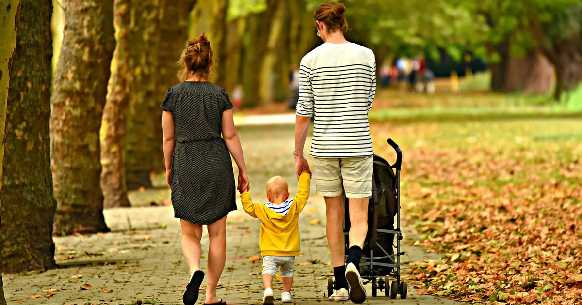 Whats Your Job as a Parent caring mother father with child
