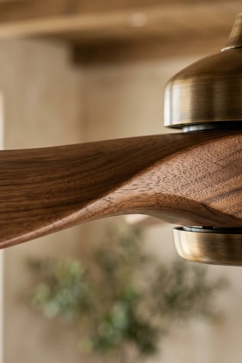 Close-up profile of precision angled 14-degree aerodynamic ceiling fan blade edge